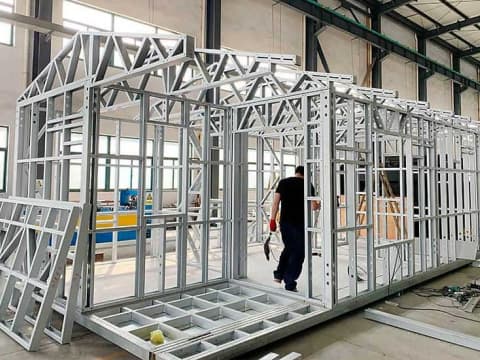 Foldable house frame