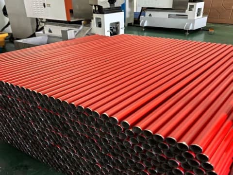 Red spray-painted steel pipe